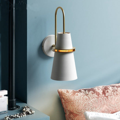 White cone wall light in a hallway