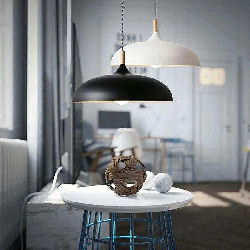 Macaron dome ceiling lamp with oak wood stem in a Scandinavian dining room