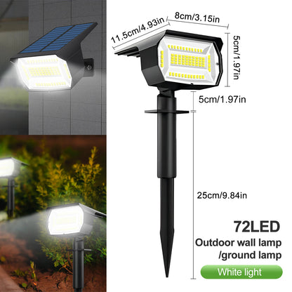 Garden landscape light illuminating tree and shrub