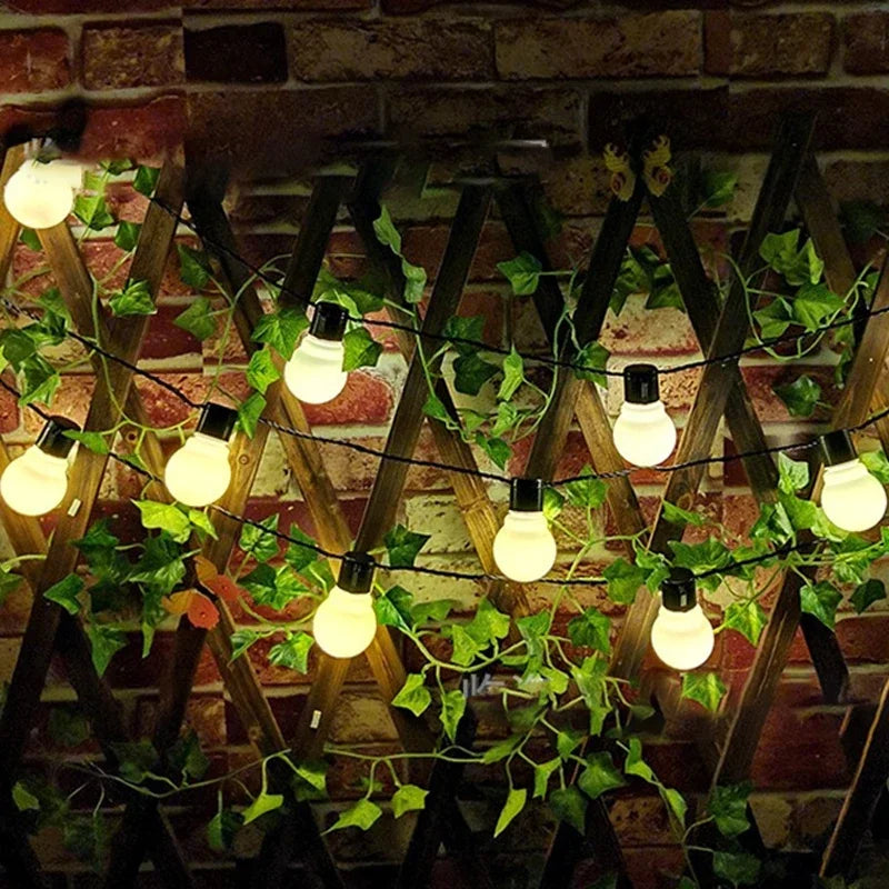 Solar festoon globe lights illuminating patio at night