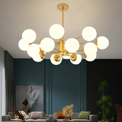 Gold glass chandelier with milky globes in a dark green dining room