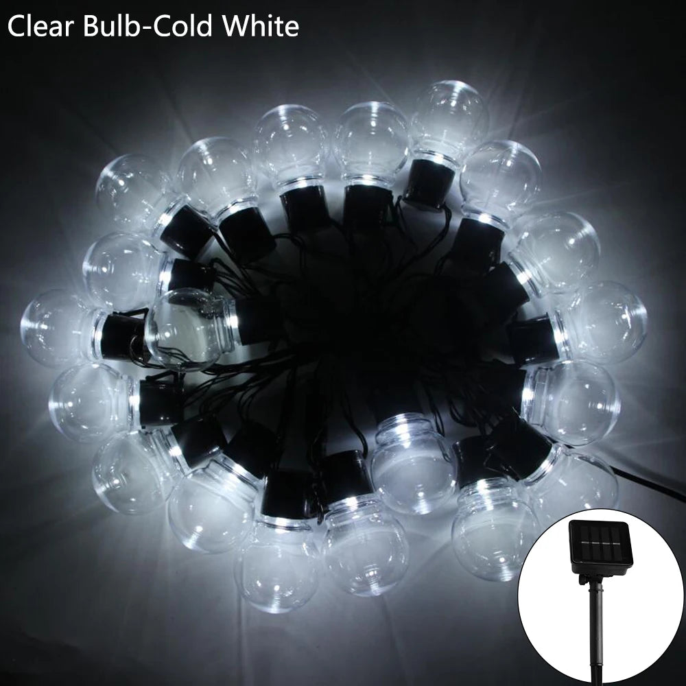 Festoon globe lights Christmas outdoor garden setting