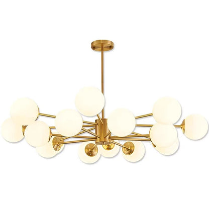 Gold glass globe chandelier on a plain white background