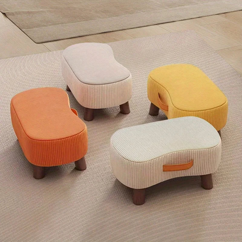 Shoe bench ottoman in hallway with shoes stored underneath