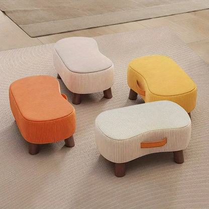 Shoe bench ottoman in hallway with shoes stored underneath