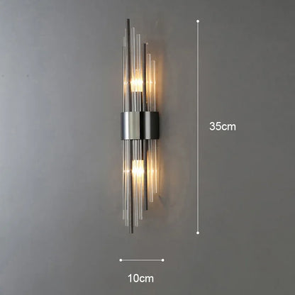 Gold wall light installed on hallway staircase wall