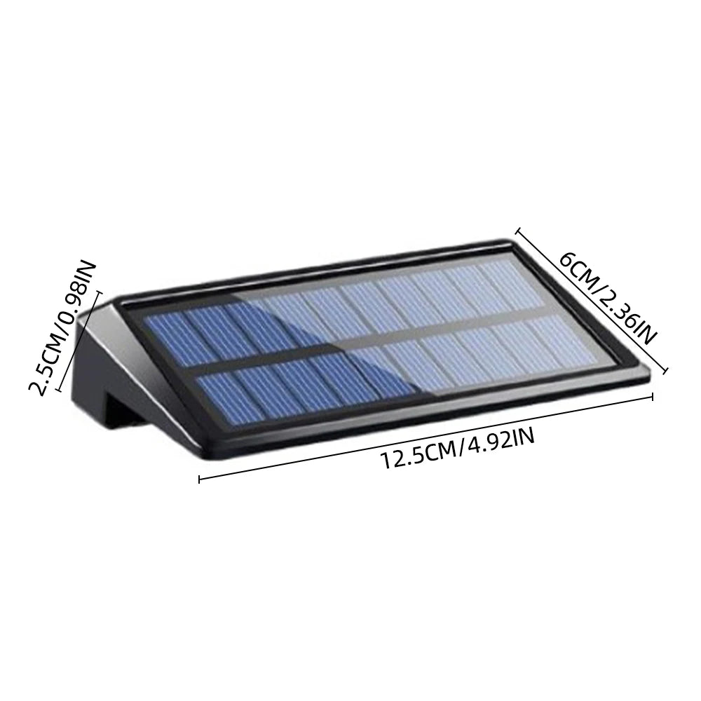 Solar powered wall light warm white on deck post