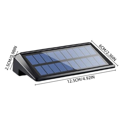 Solar powered wall light warm white on deck post