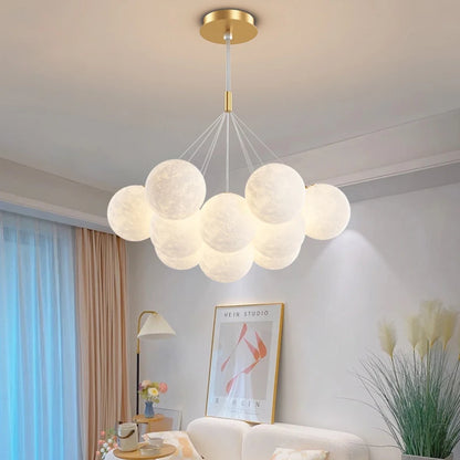 3D moon globe cluster chandelier glowing in a bedroom