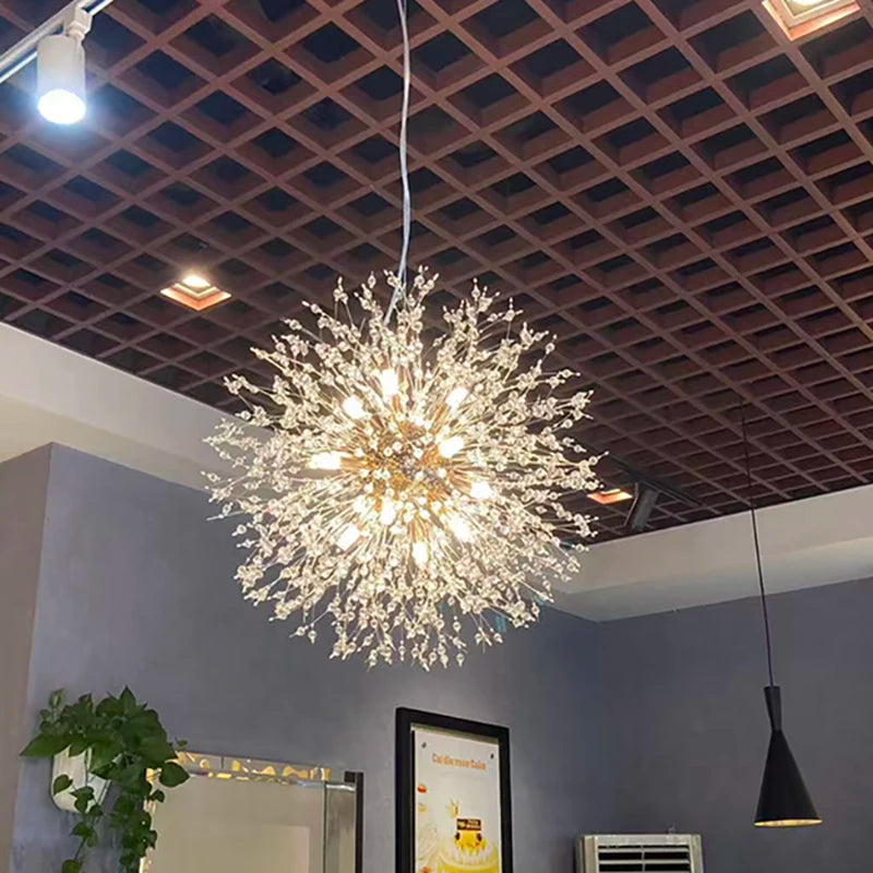 Close view of gold rods tipped with crystal sprays on the chandelier