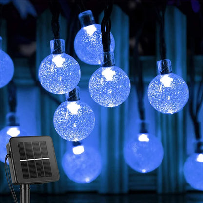 LED crystal globe lights illuminated at night