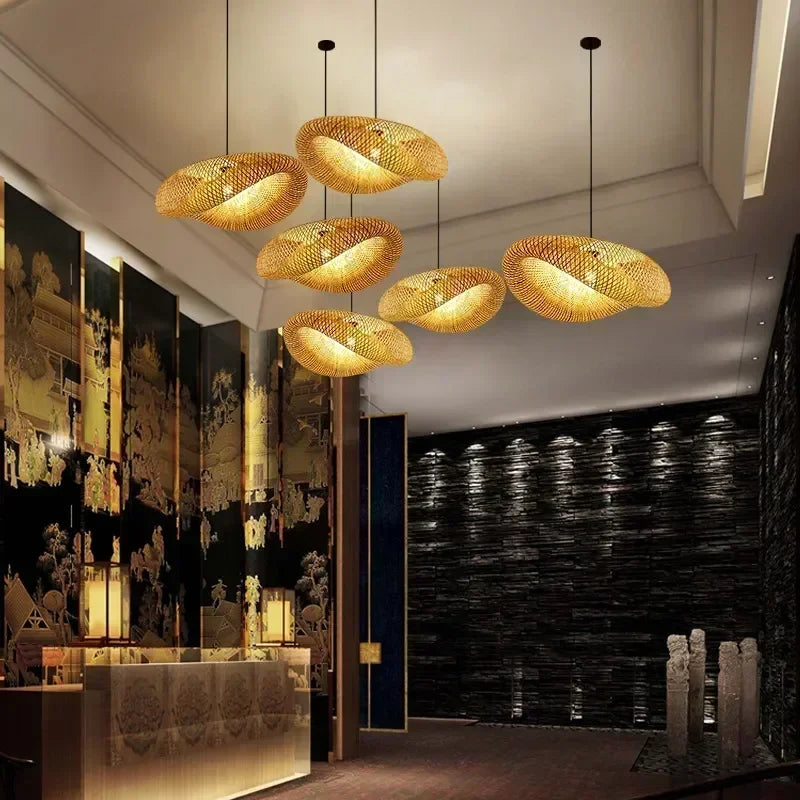 Rattan style woven bamboo pendant lights above a restaurant bar