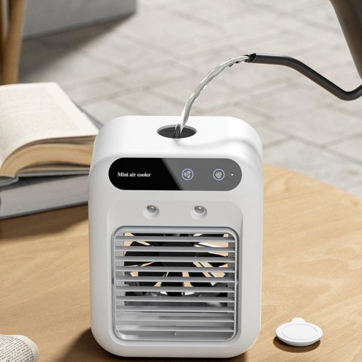 Desktop evaporative cooler showing airflow direction