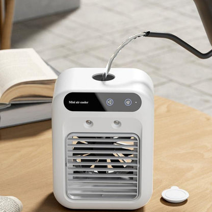 Desktop evaporative cooler showing airflow direction