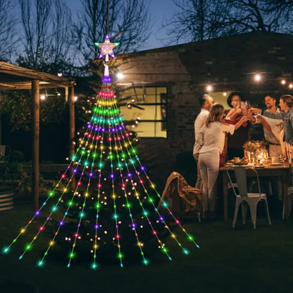 Star waterfall Christmas lights – multicolour, solar version, in a garden at night