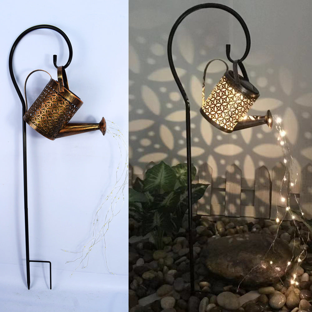 LED garden sculpture watering can light close-up detail