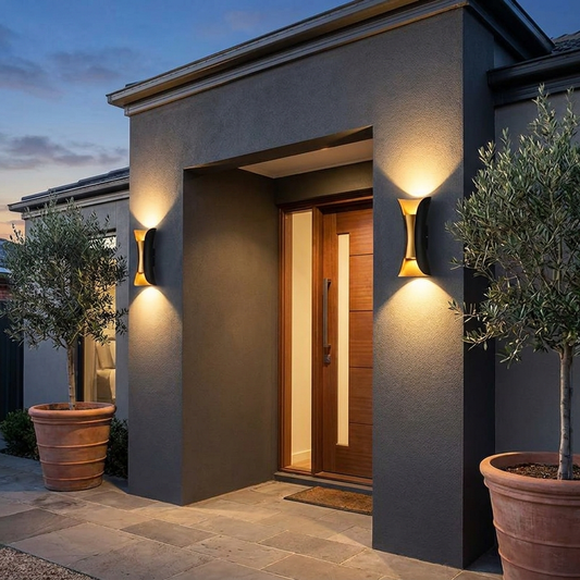 Noxel Curved Outdoor Wall Light - lifestyle shot showing pair flanking front door at dusk