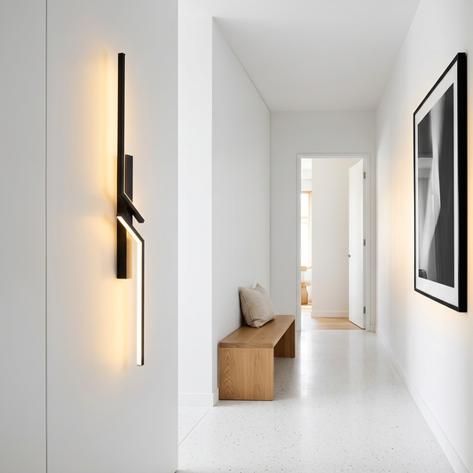Aria geometric LED wall light in minimalist hallway