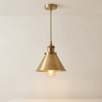 Loft industrial pendant light in brushed gold single cone with warm filament bulb