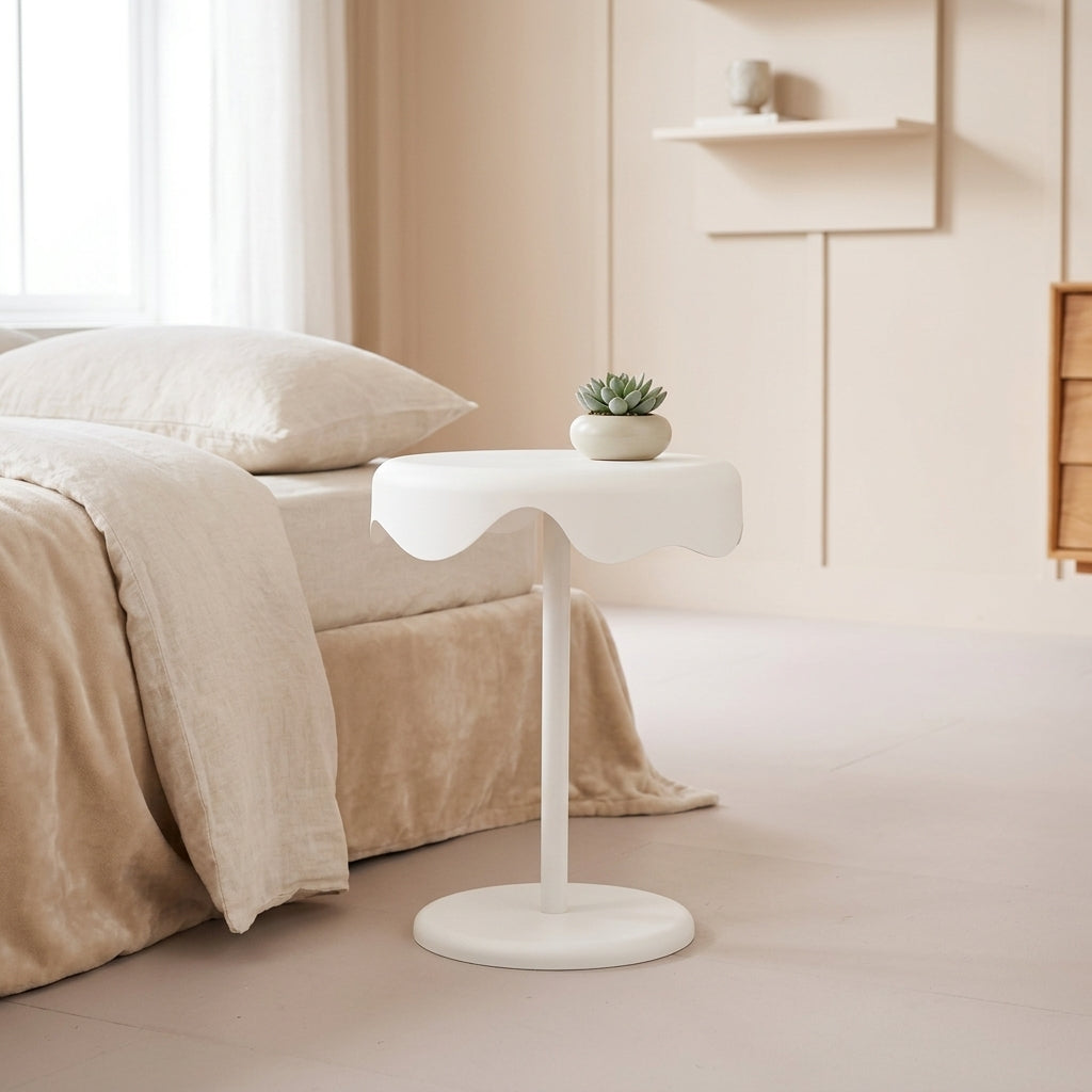 White round bedside side table styled in bright modern living room