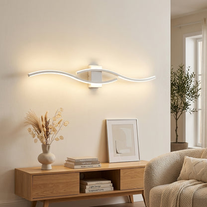 White slim aluminium LED wall sconce styled on feature wall in warm modern living room