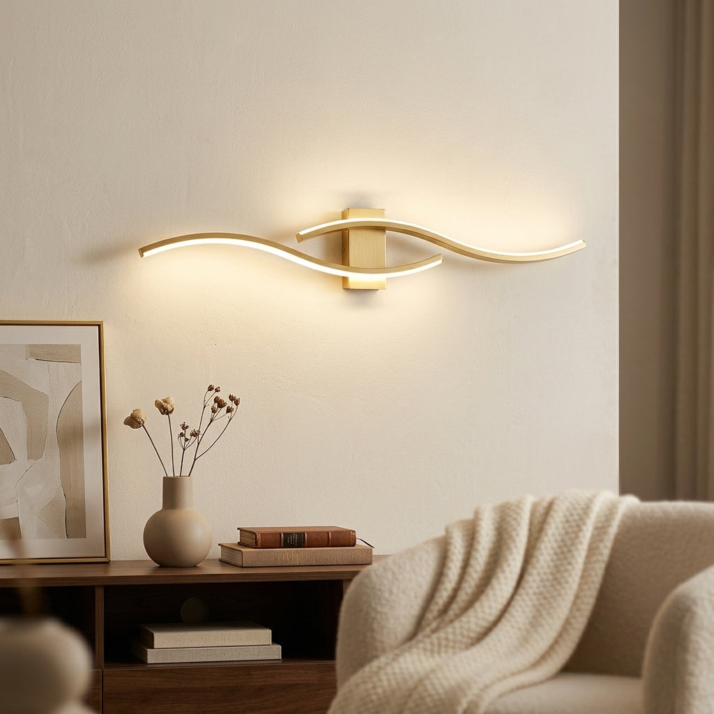 Gold slim aluminium LED wall sconce styled on feature wall in warm modern living room