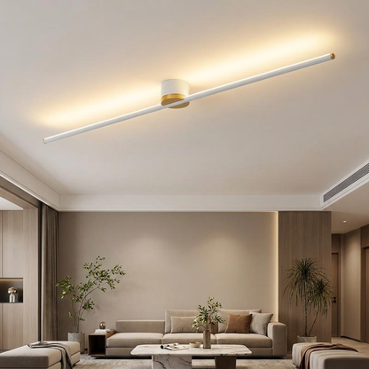 Erix Linear Flush Mount Ceiling Light in white, up glow, in a modern minimalist living room