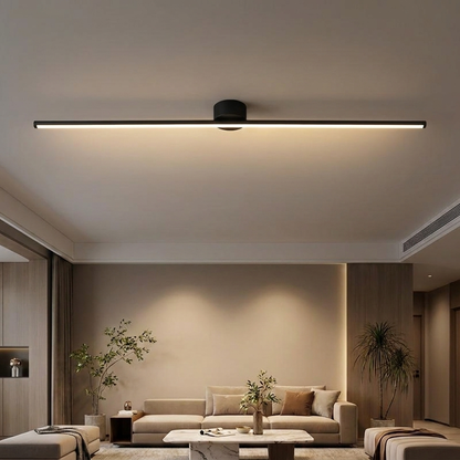 Erix Linear Flush Mount Ceiling Light in black, down glow, in a modern minimalist living room
