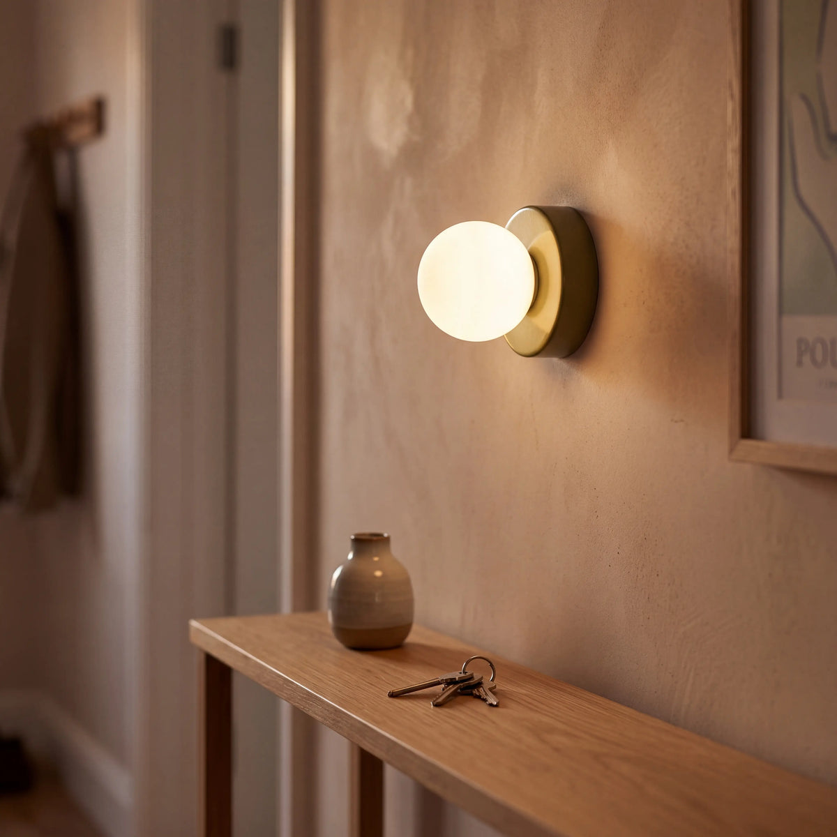 Sage green mini macaron glass globe wall sconce, wall mounted in a UK children's room