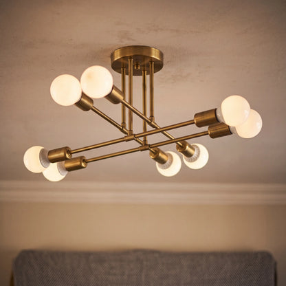 Gold 8 arm sputnik semi flush ceiling light, D70cm mid century chandelier in a UK dining room