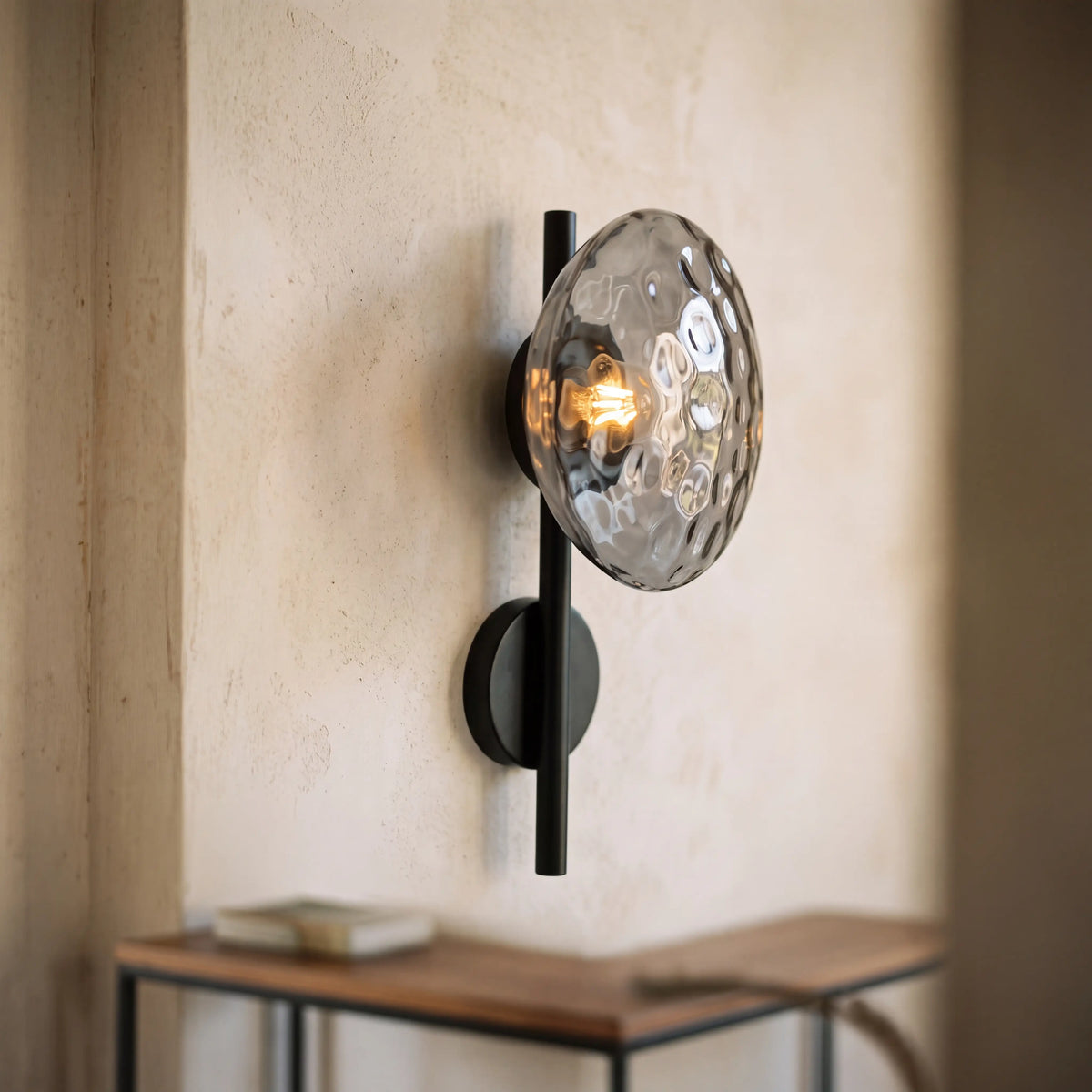 Black and grey dimpled glass wall sconce, rod style H40cm, wall mounted in a UK living room