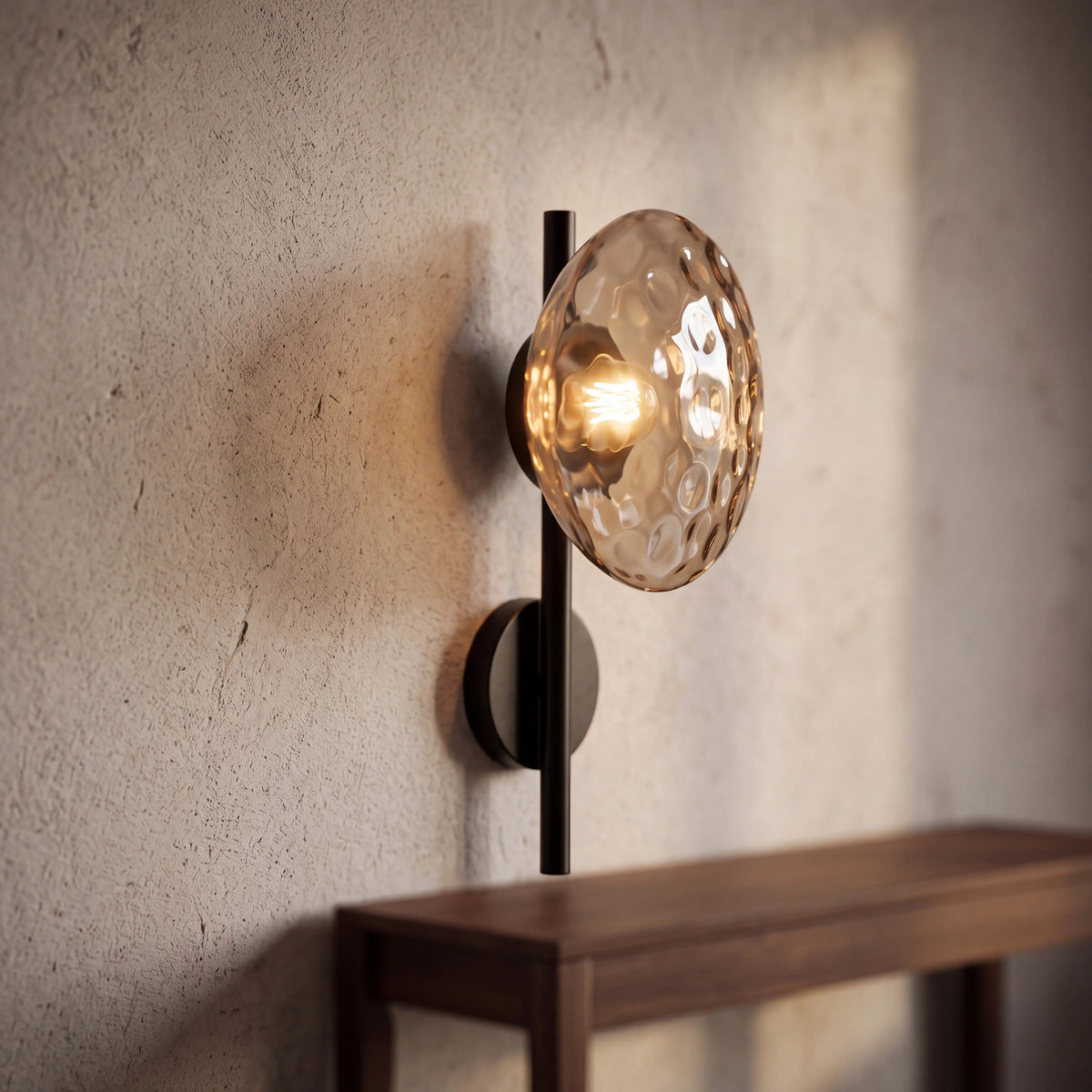 Black and amber dimpled glass wall sconce, rod style H40cm, wall mounted in a UK bedroom