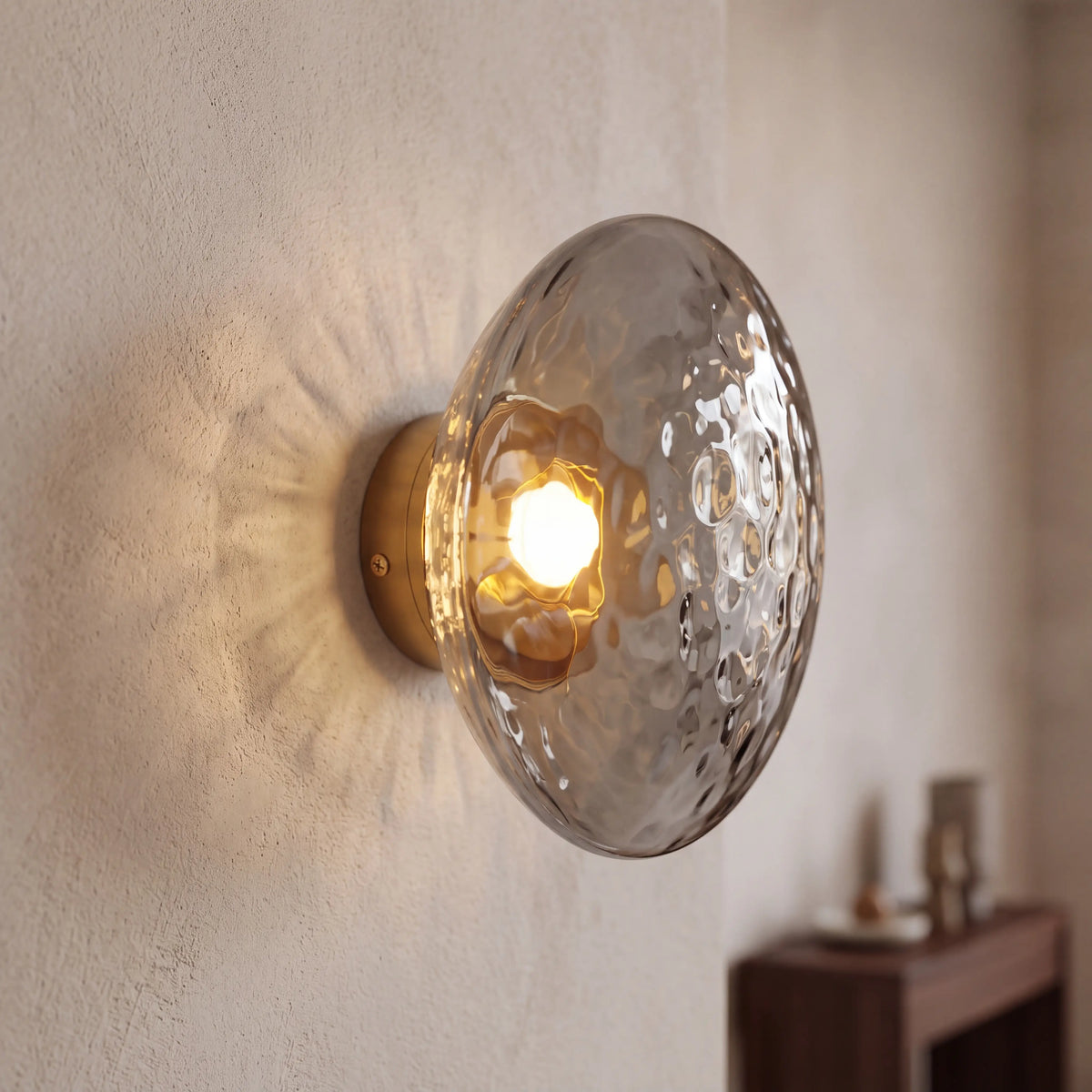 Gold and grey dimpled glass wall sconce, flush style D15cm, wall mounted in a UK living room