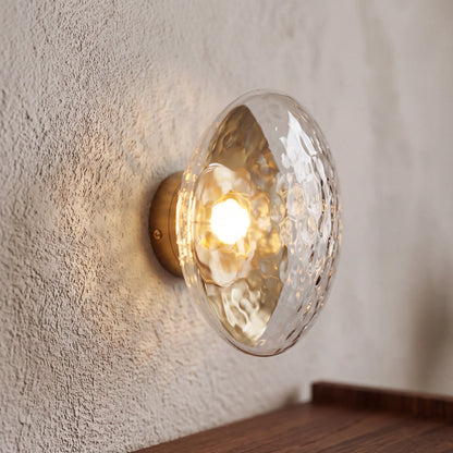 Gold and clear dimpled glass wall sconce, flush style D15cm, wall mounted in a UK hallway