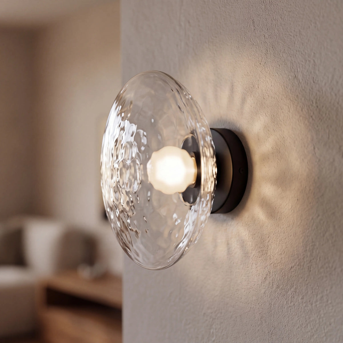 Black and clear dimpled glass wall sconce, flush style D15cm, wall mounted in a UK living room