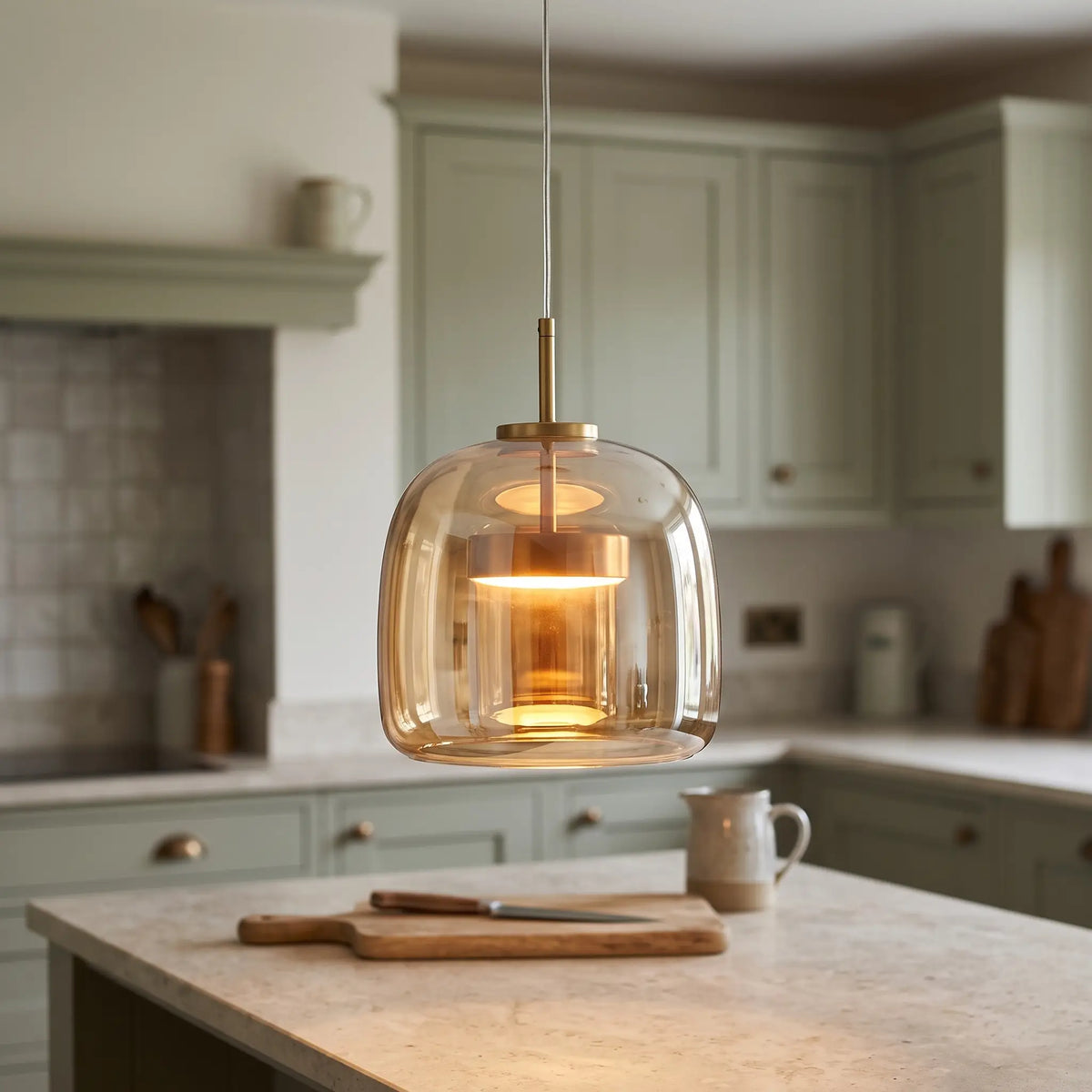 Glass halo pendant light – Style A – Cognac – over a kitchen island