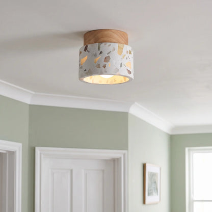 Terrazzo and wood flush ceiling light – Small – Oak – in a hallway