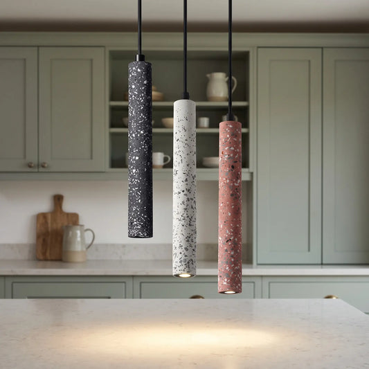 Terrazzo tube pendant lights – Black, White and Pink – over a kitchen island