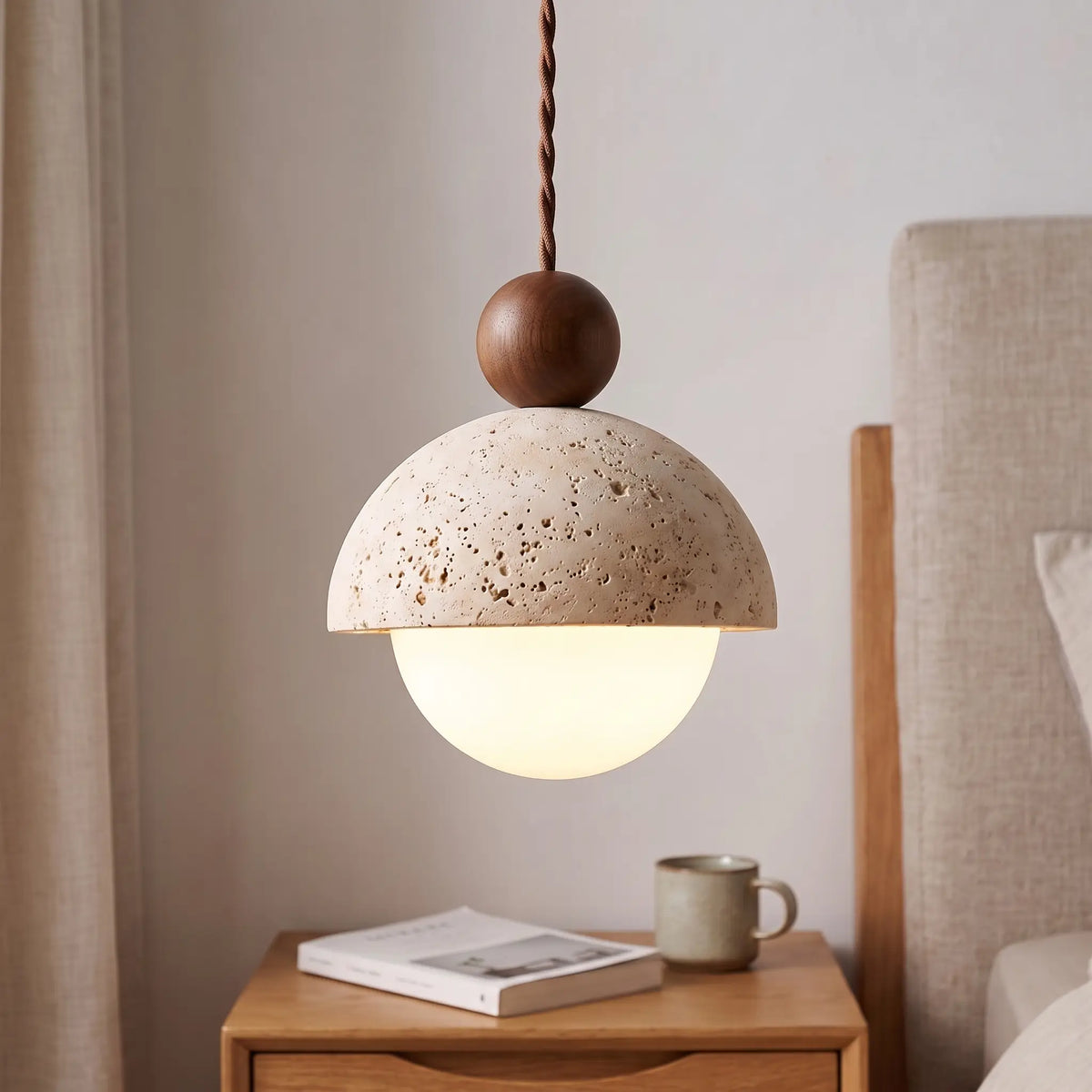 Travertine stone dome pendant light – Walnut – beside a bed