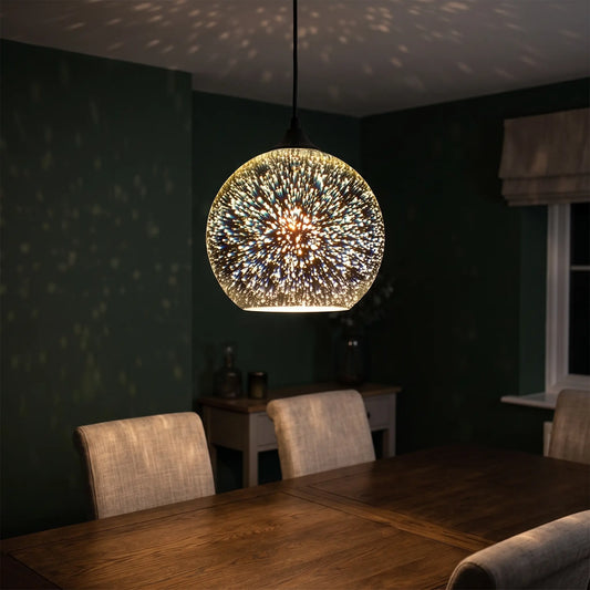 3D firework glass globe pendant light – lit in the evening over a dining table