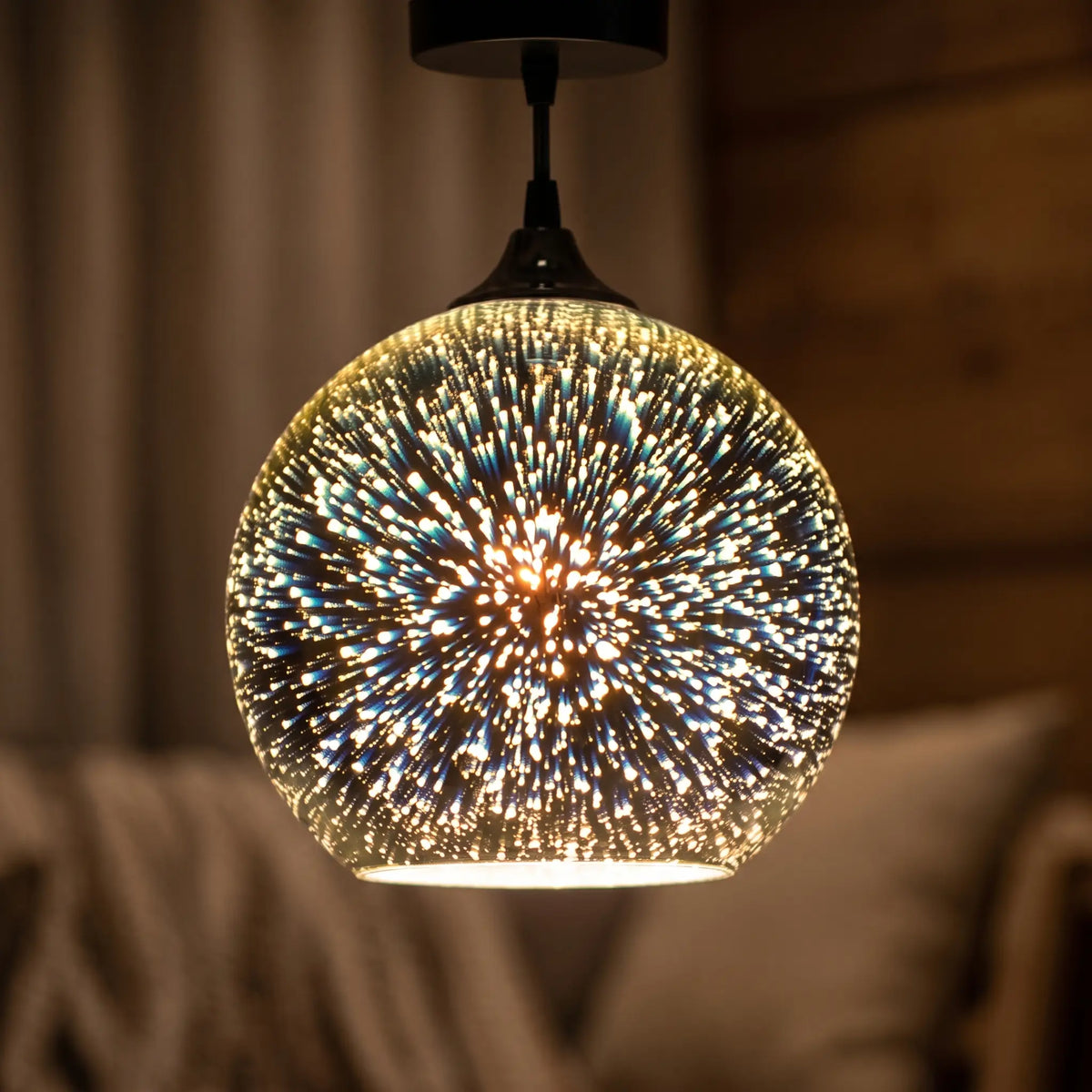 3D firework glass globe pendant light – close-up of the starburst glow
