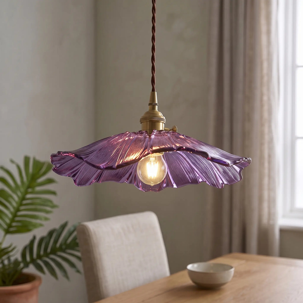 Ribbed glass lotus pendant light – Purple – over a dining table