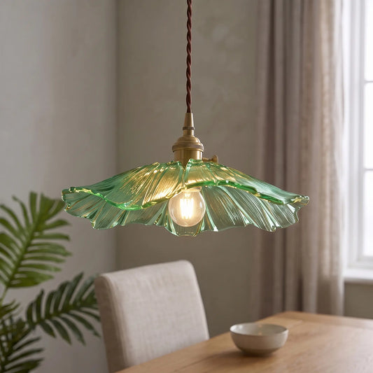 Ribbed glass lotus pendant light – Green – over a dining table