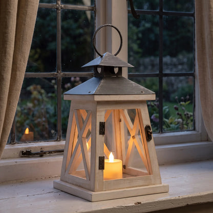 White wooden cottage candle lantern on a windowsill, 22cm