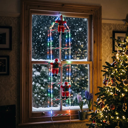 Climbing Santa ladder LED Christmas lights hanging in a living room window