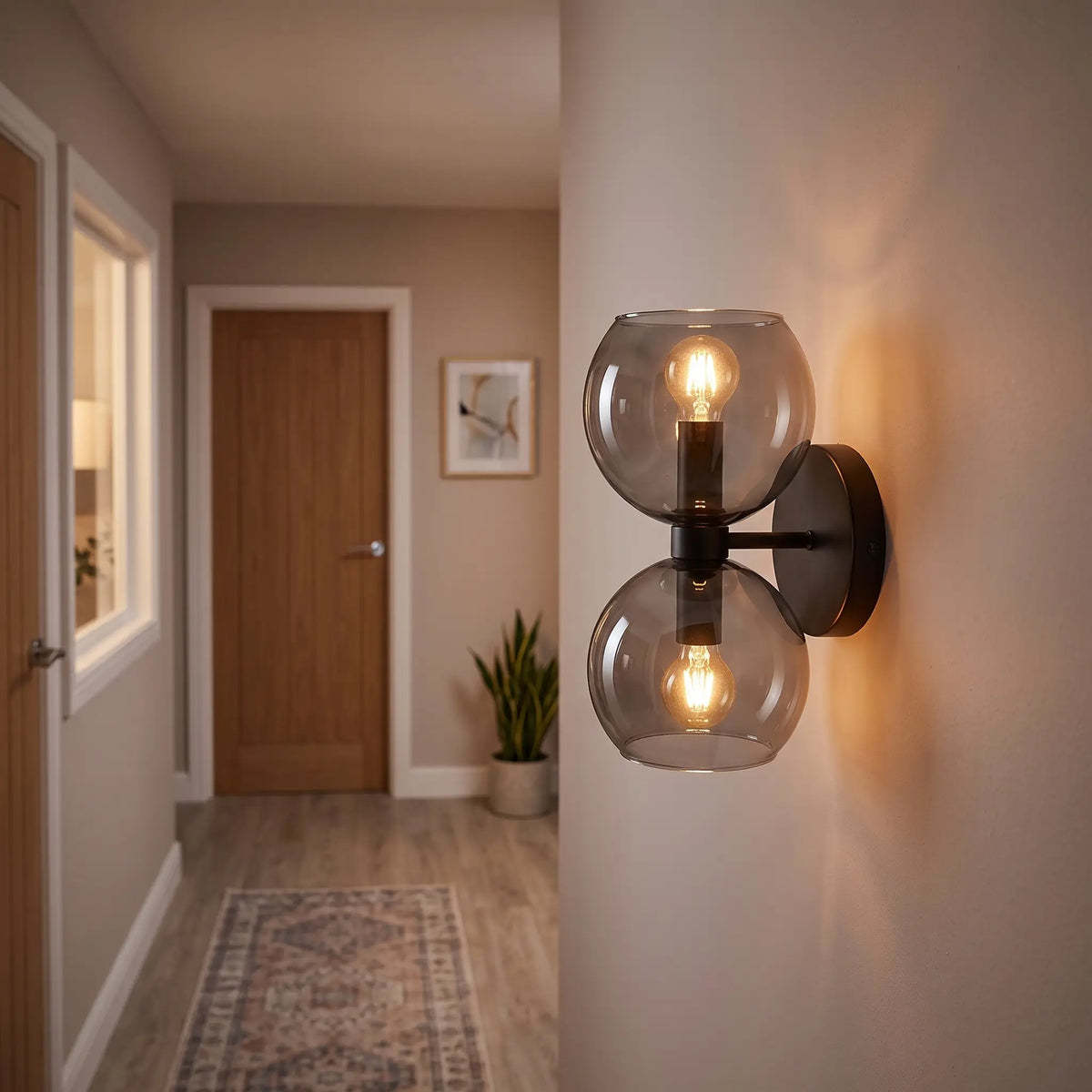 Smoke grey glass hourglass wall light in a hallway