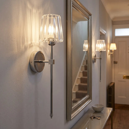 Silver crystal glass rechargeable wall sconce in a hallway