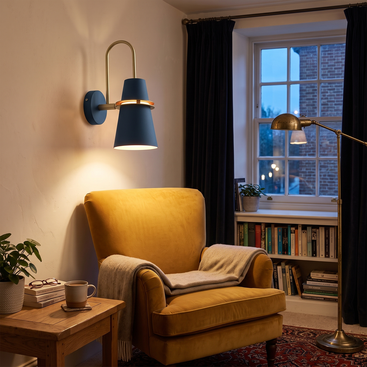 Deep blue Nordic cone wall light lit beside a mustard armchair