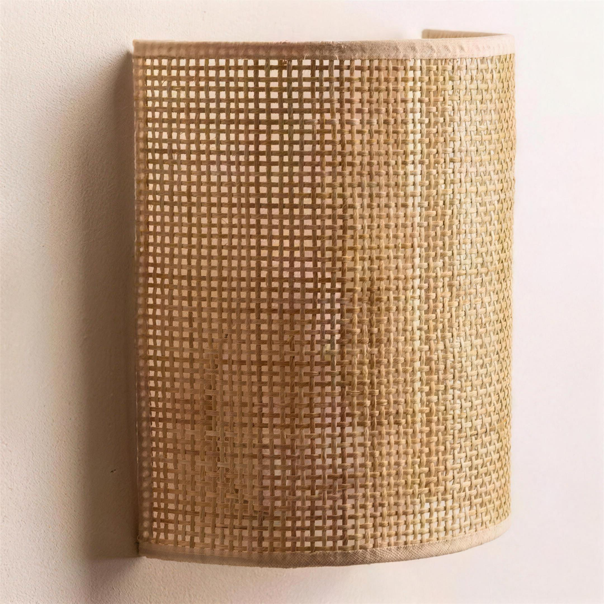 Woven cane-style half cylinder wall light
