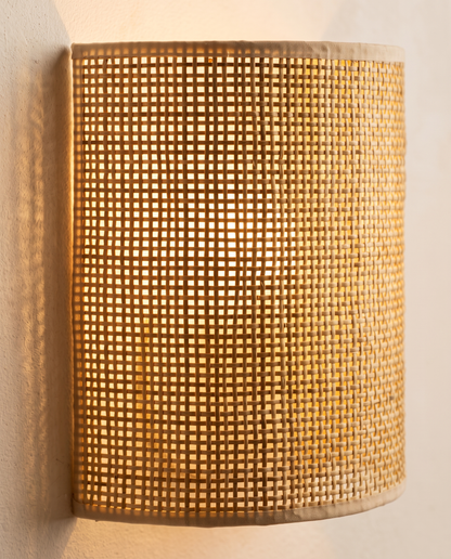 Close-up of woven grid shade glowing